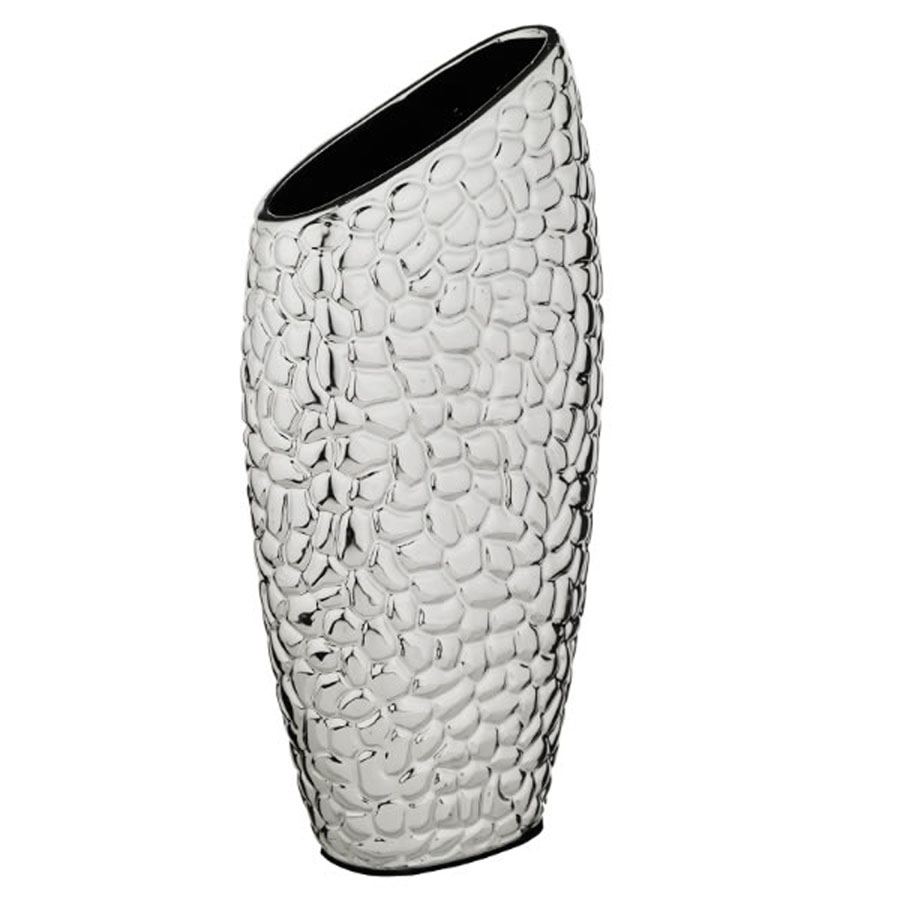 Vaso laminato in argento con disegni in rilievo roccia